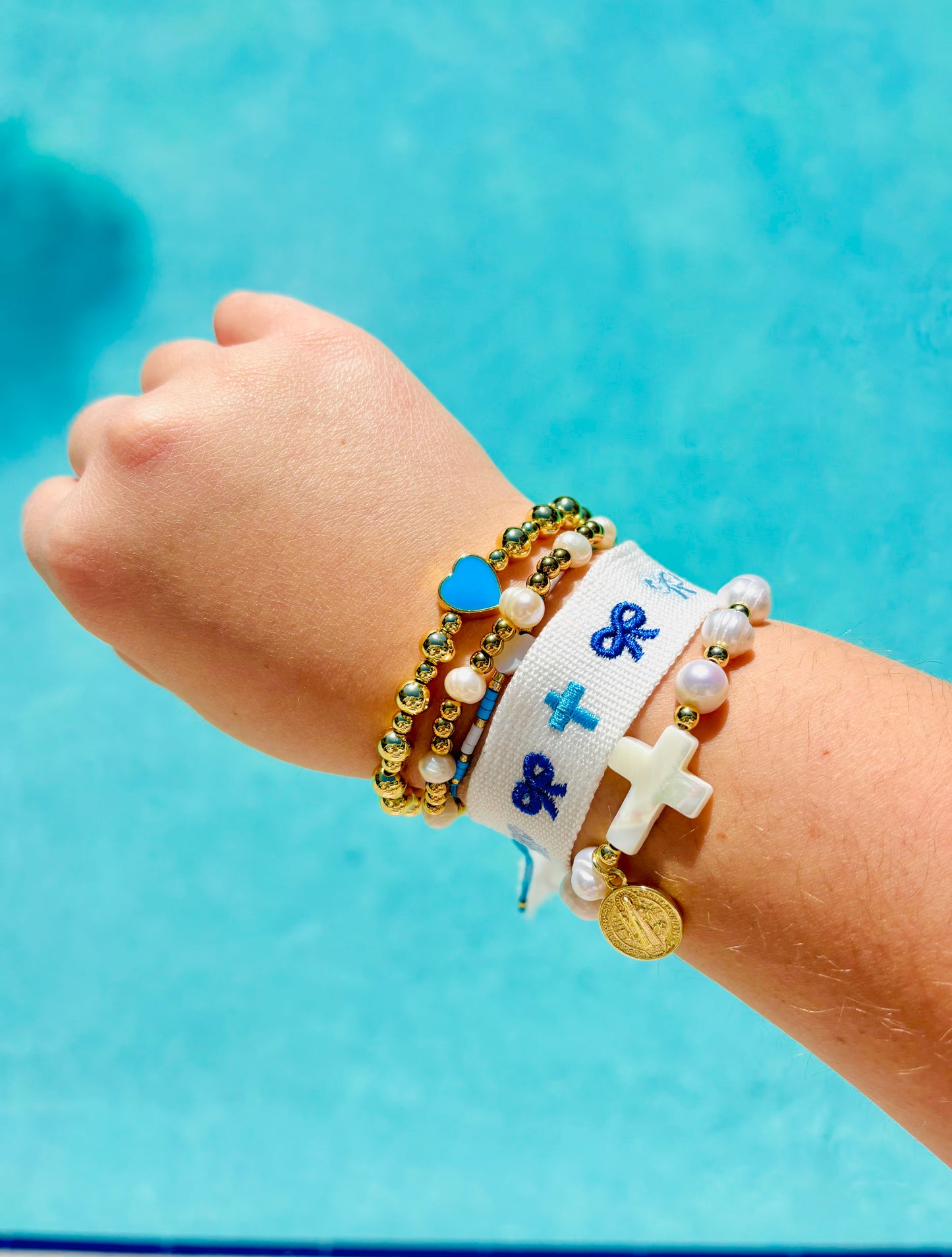 Katie blue bow & cross woven adjustable bracelet