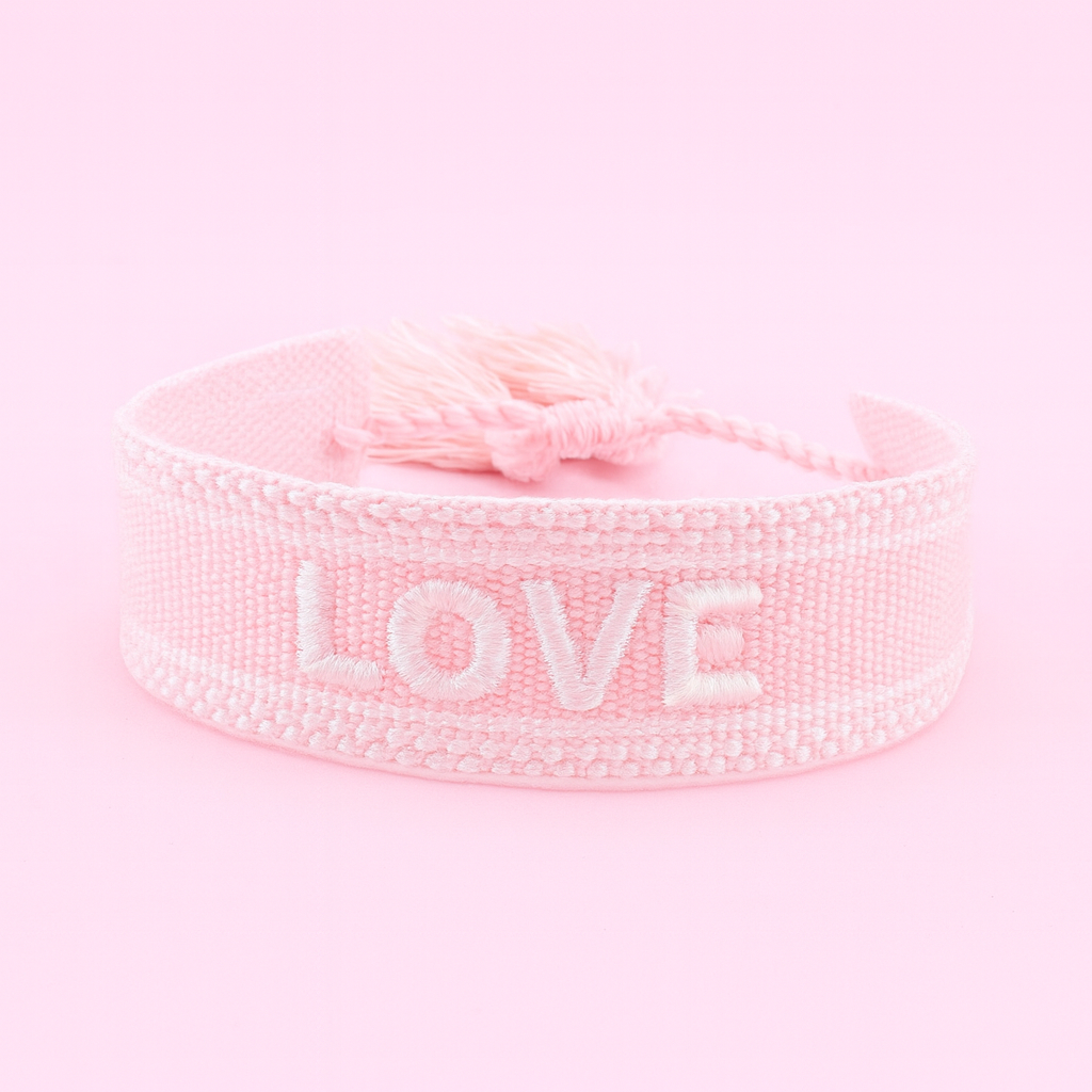 Love coral and cream woven bracelet