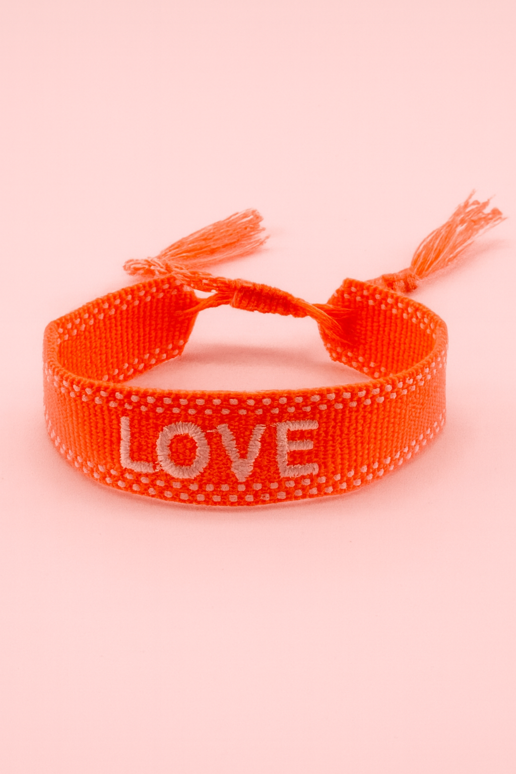 Love neon orange and white adjustable woven bracelet