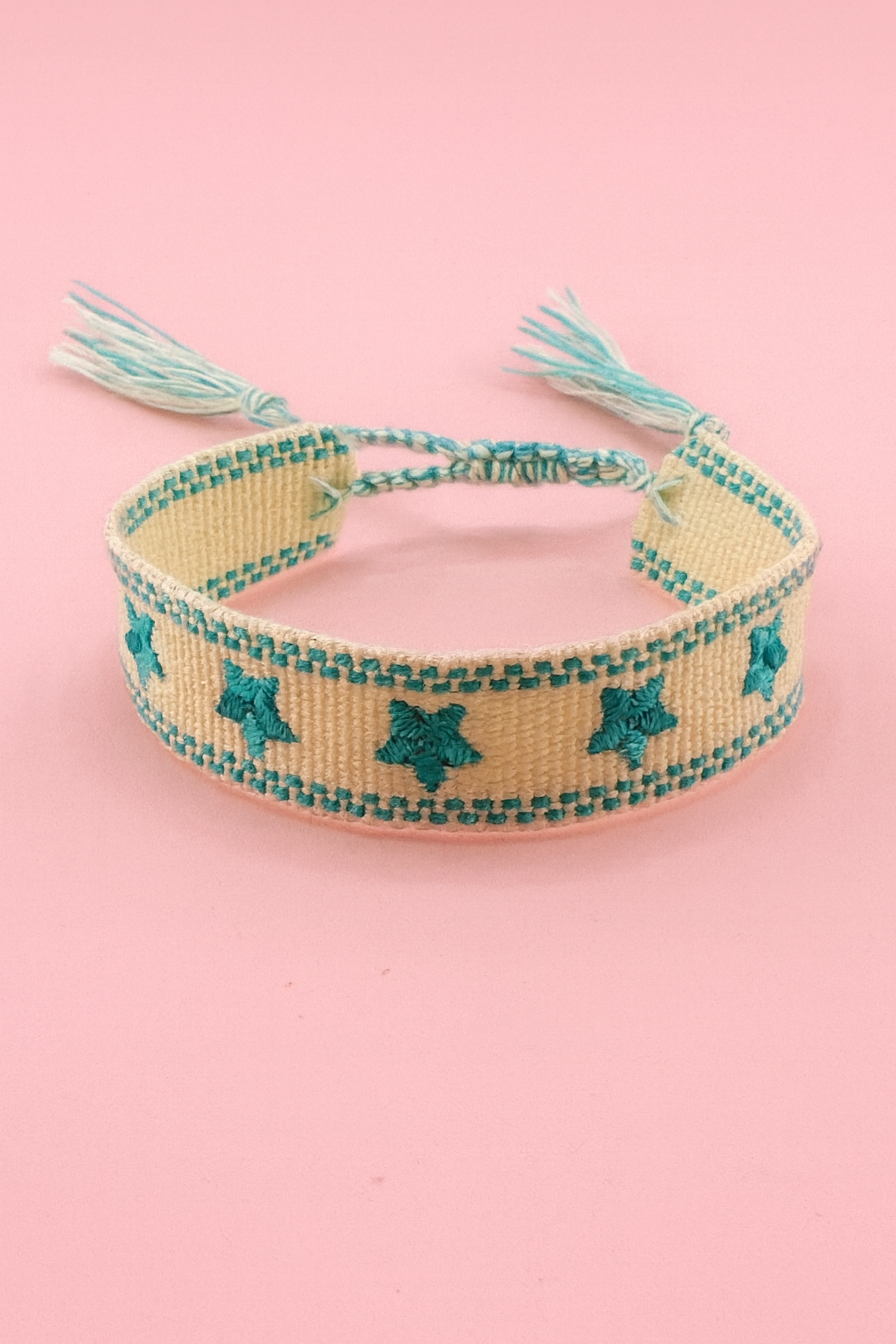 Cream and blue stars adjustable woven bracelet