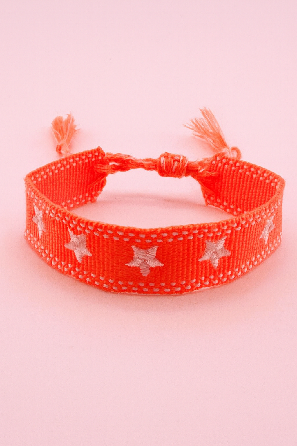 Orange neon & white star adjustable woven bracelet