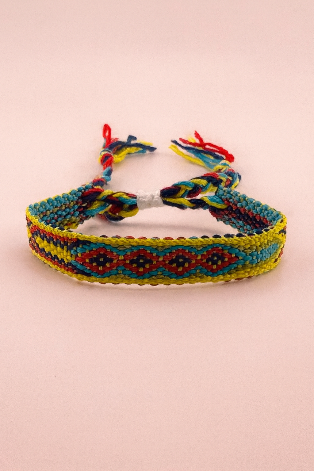 Bassie multicolored yellow, blue & red adjustable woven bracelet