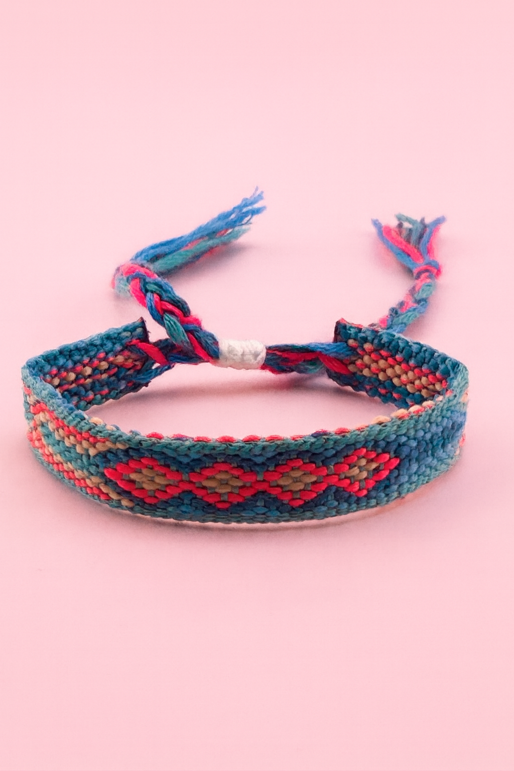 Bassie blue, pink, and orange adjustable woven bracelet