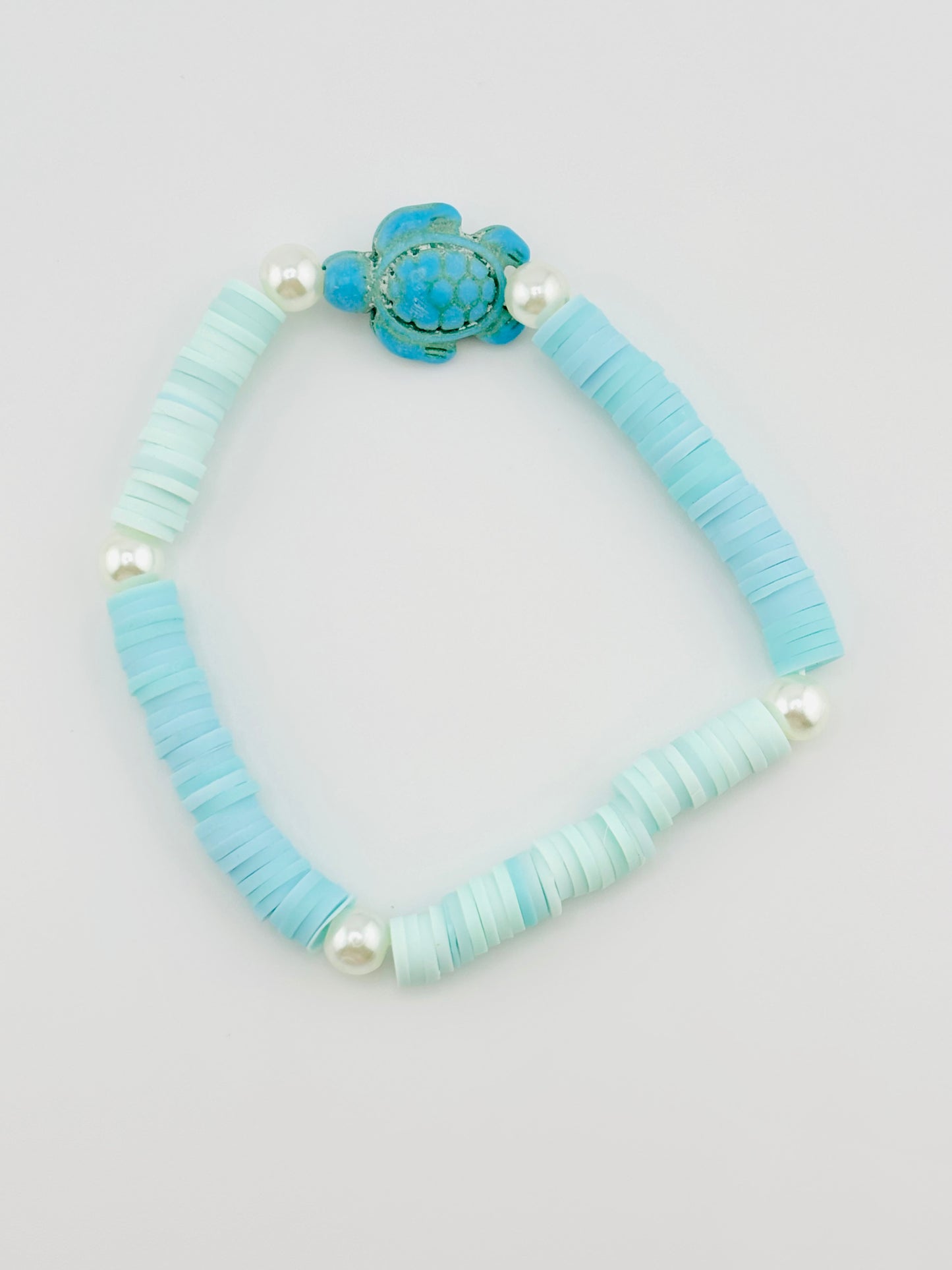 Quenelle blue beaded bracelet