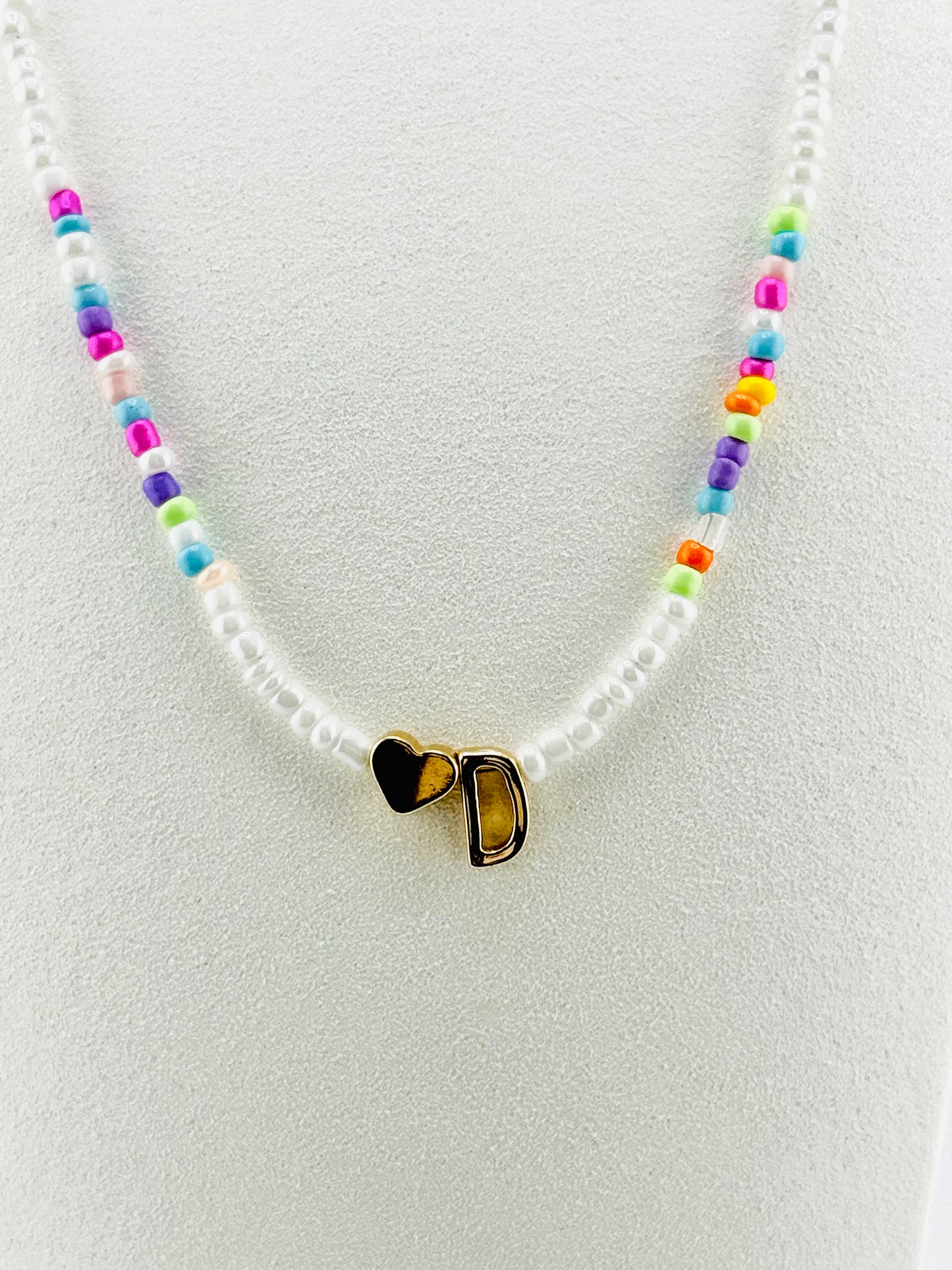 D beaded Initial necklace in white and pastel colors