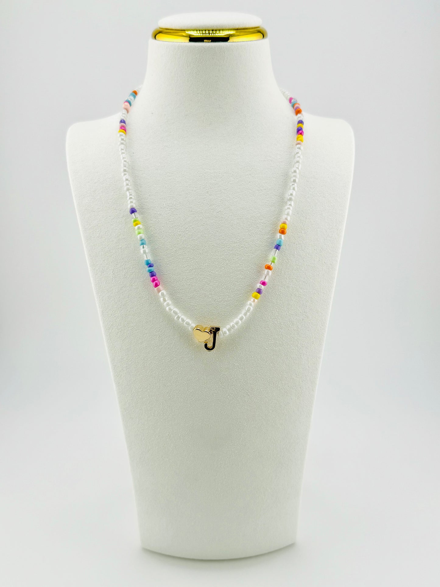 J beaded Initial necklace in white and pastel colors
