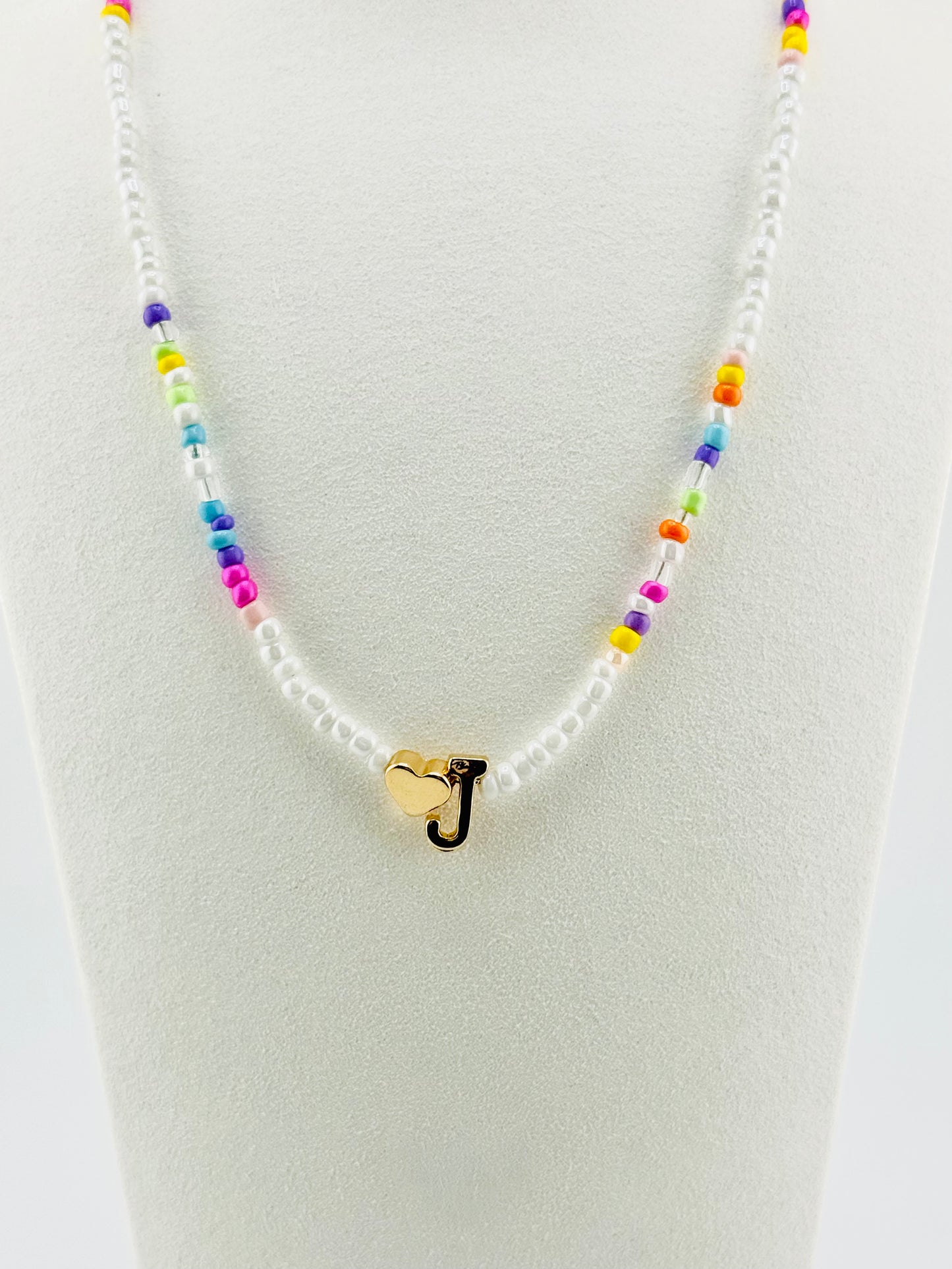 J beaded Initial necklace in white and pastel colors