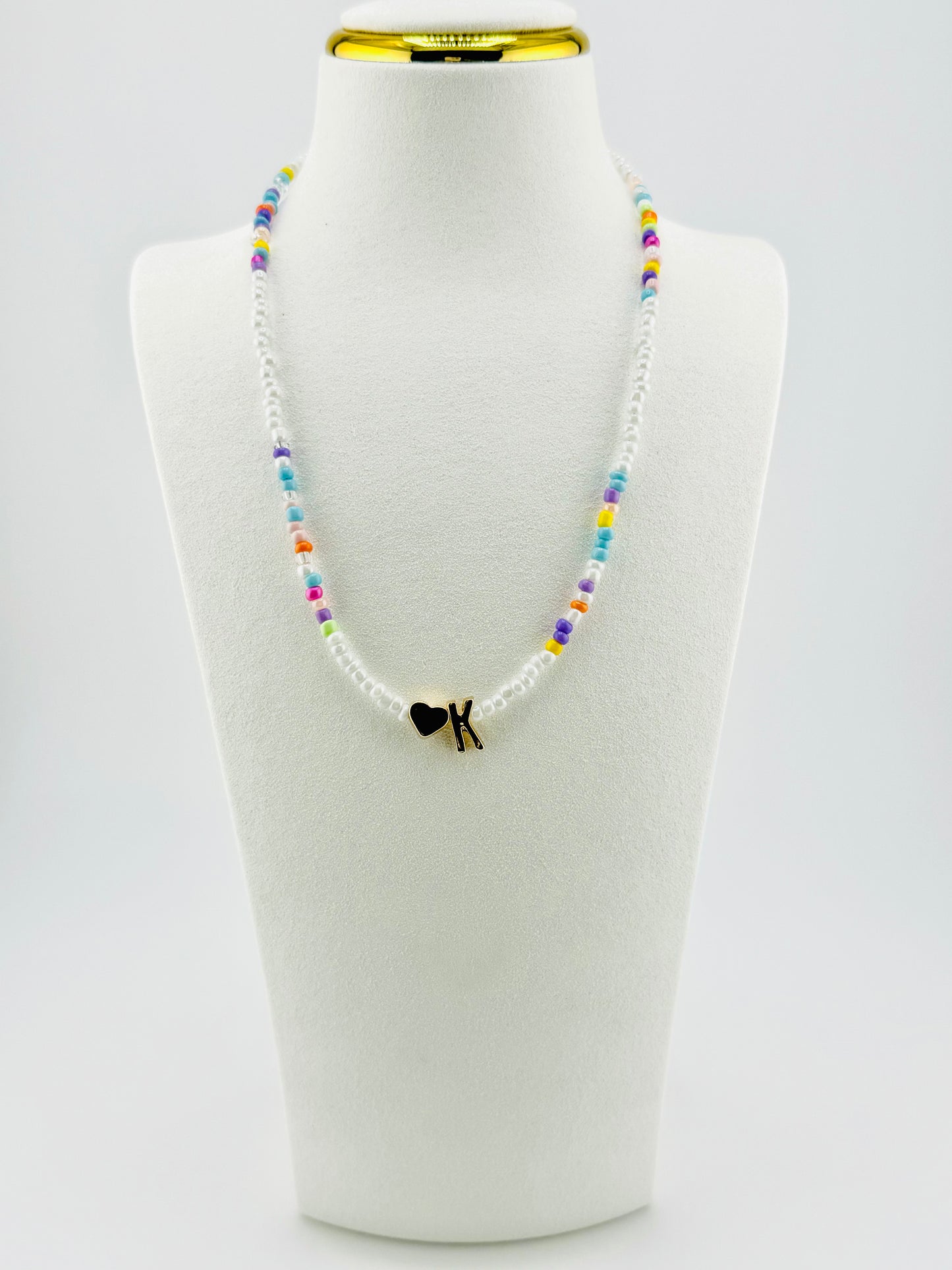 K beaded Initial necklace in white and pastel colors