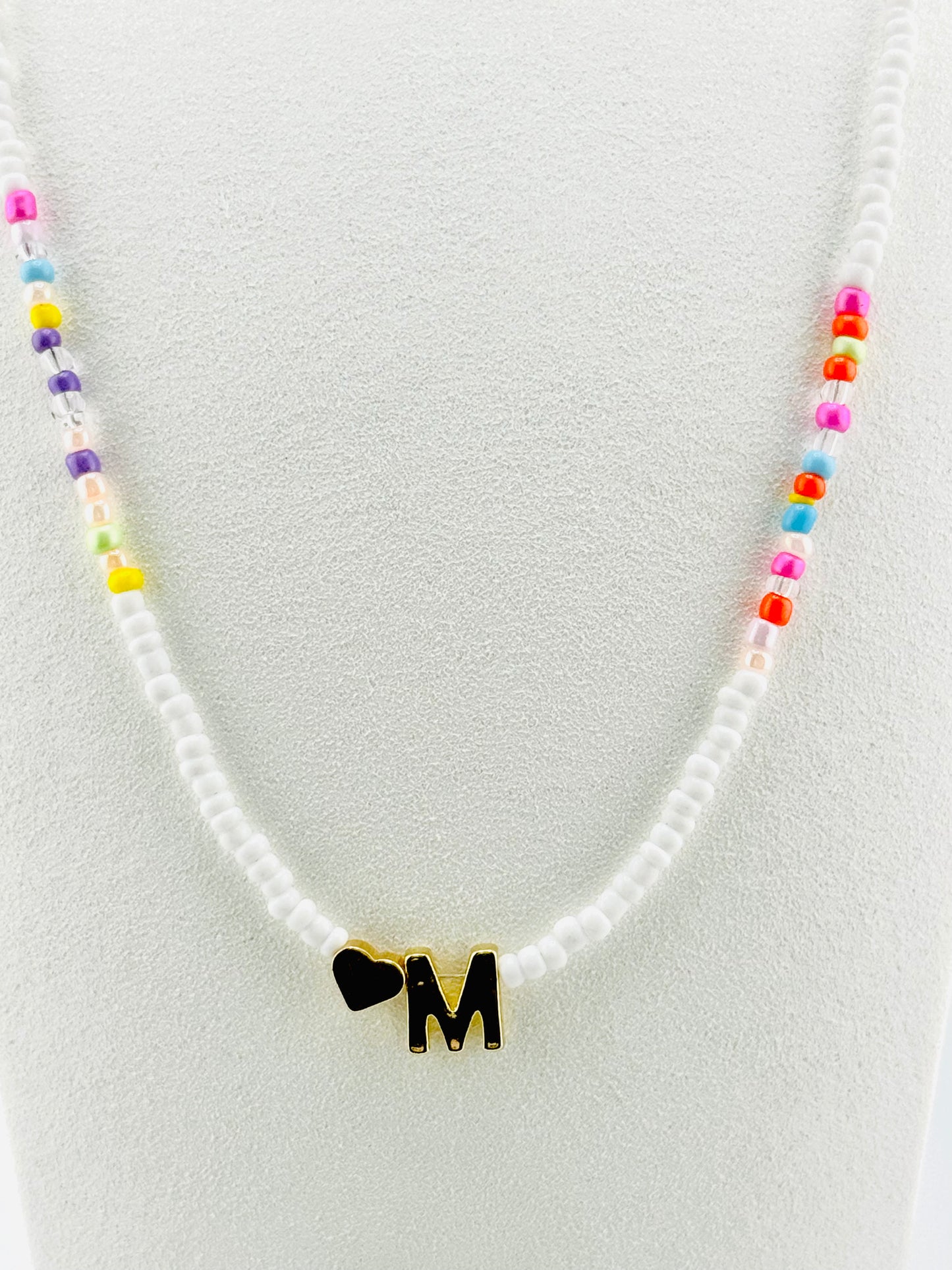 M beaded Initial necklace in white and pastel colors