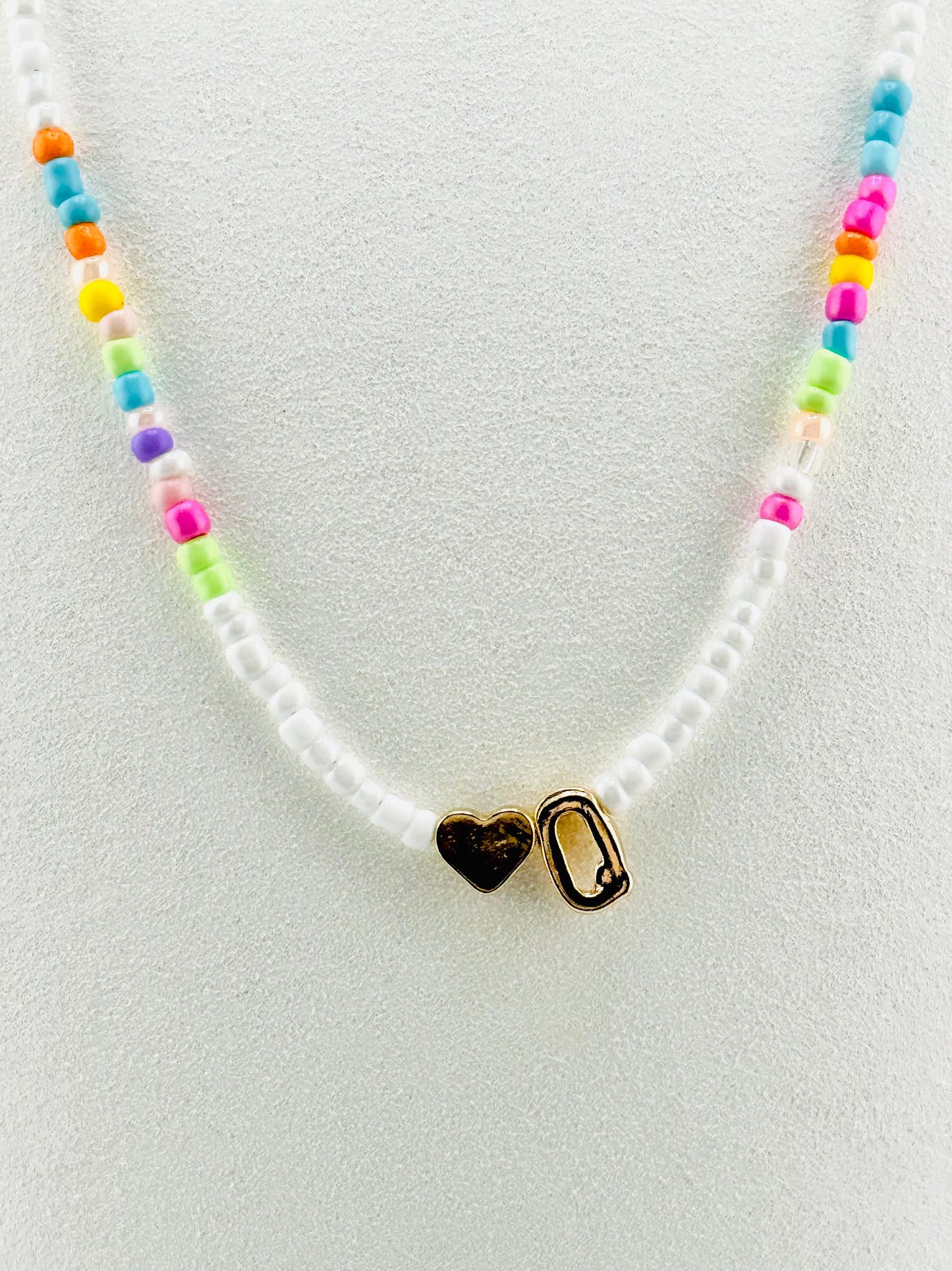 Q beaded Initial necklace in white and pastel colors