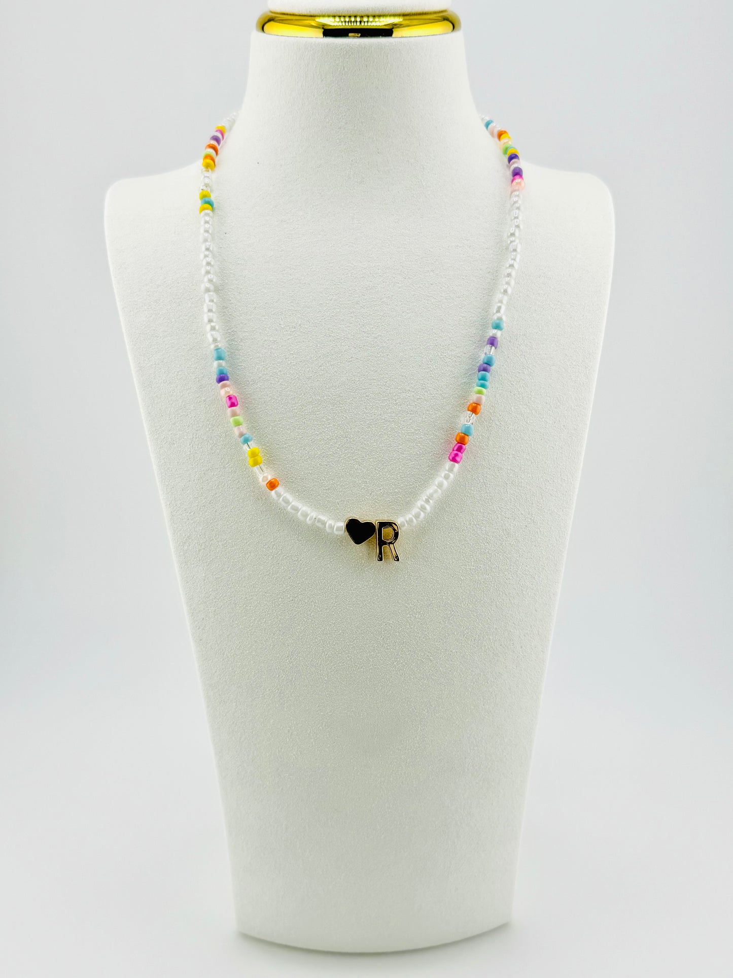 R beaded Initial necklace in white and pastel colors