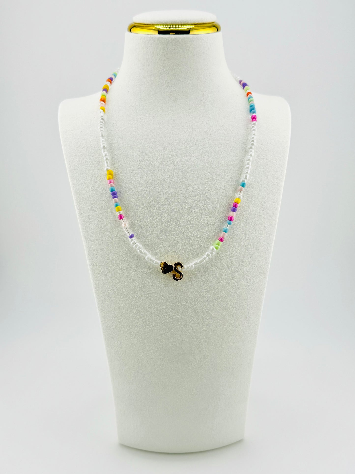 S beaded Initial necklace in white and pastel colors