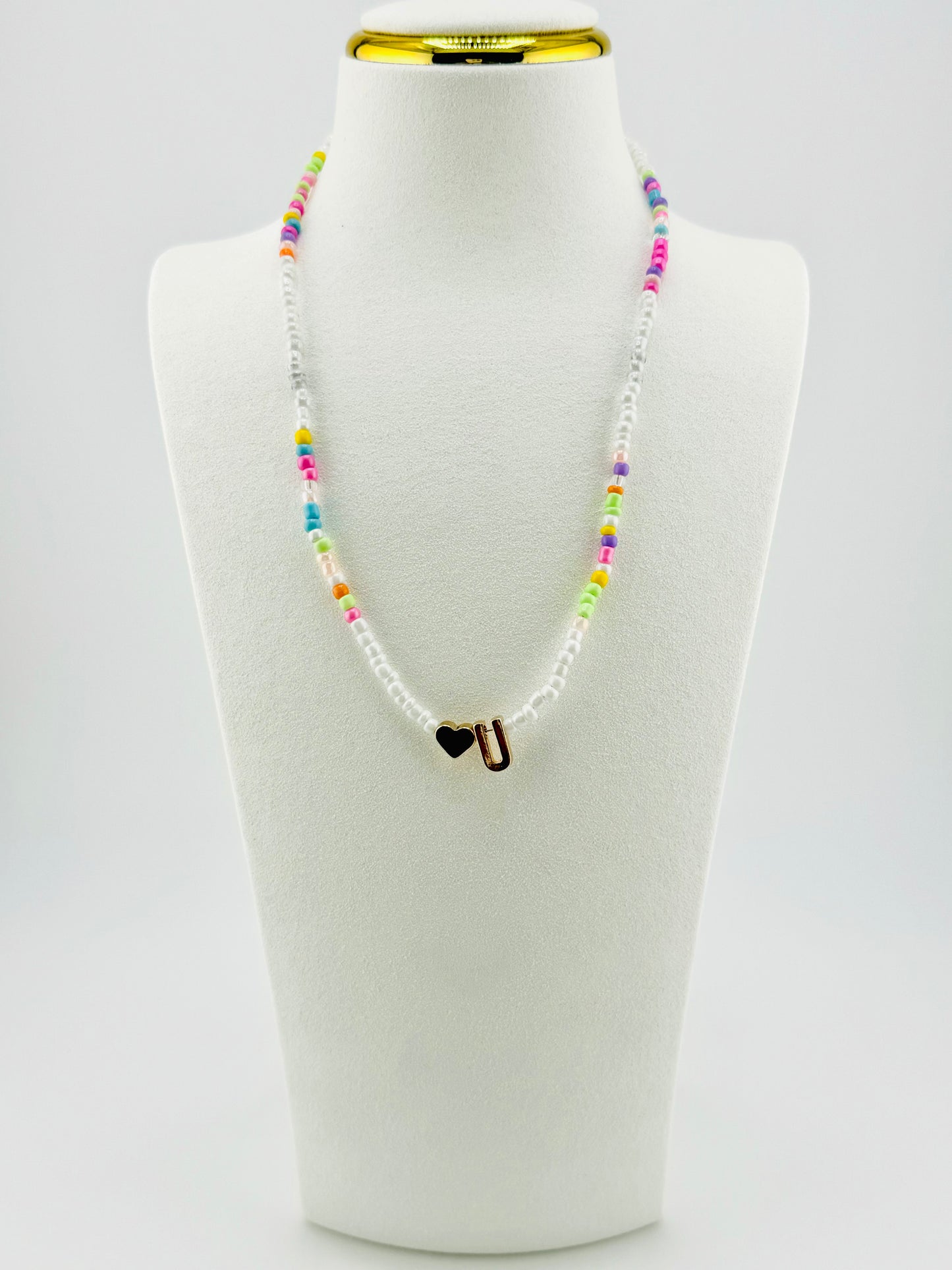 U beaded Initial necklace in white and pastel colors