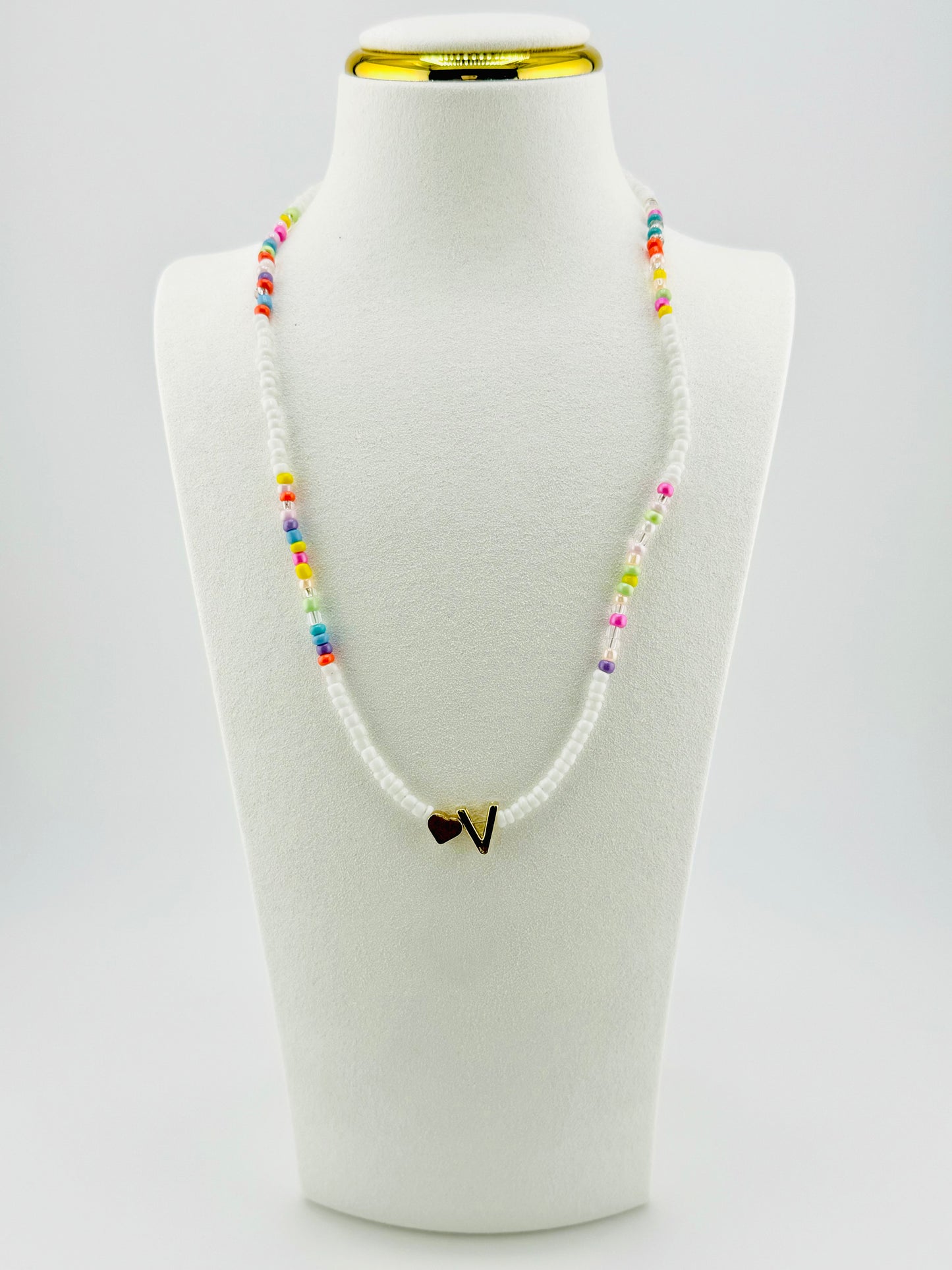 V beaded Initial necklace in white and pastel colors
