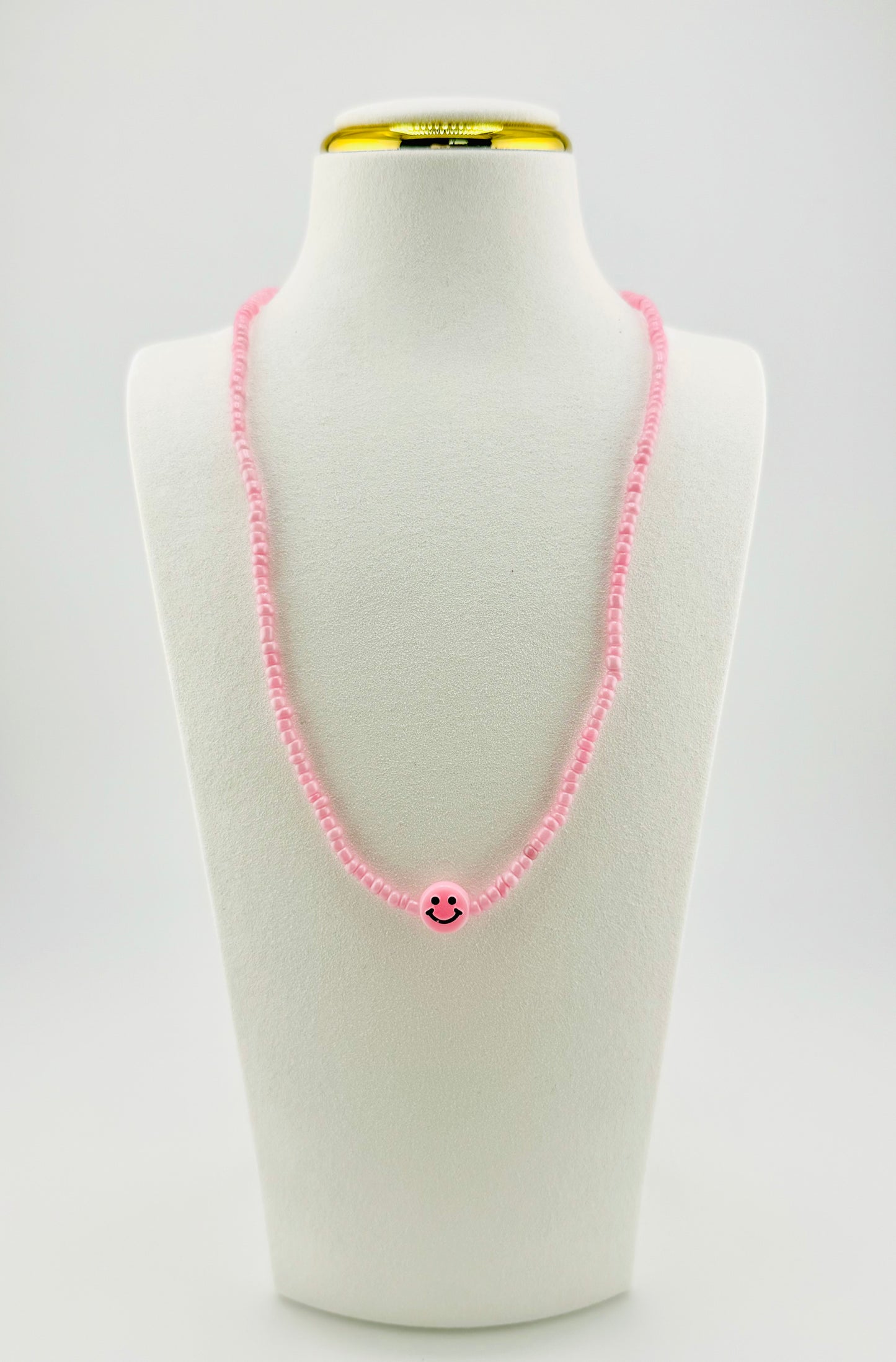Eiliana pink happy face necklace