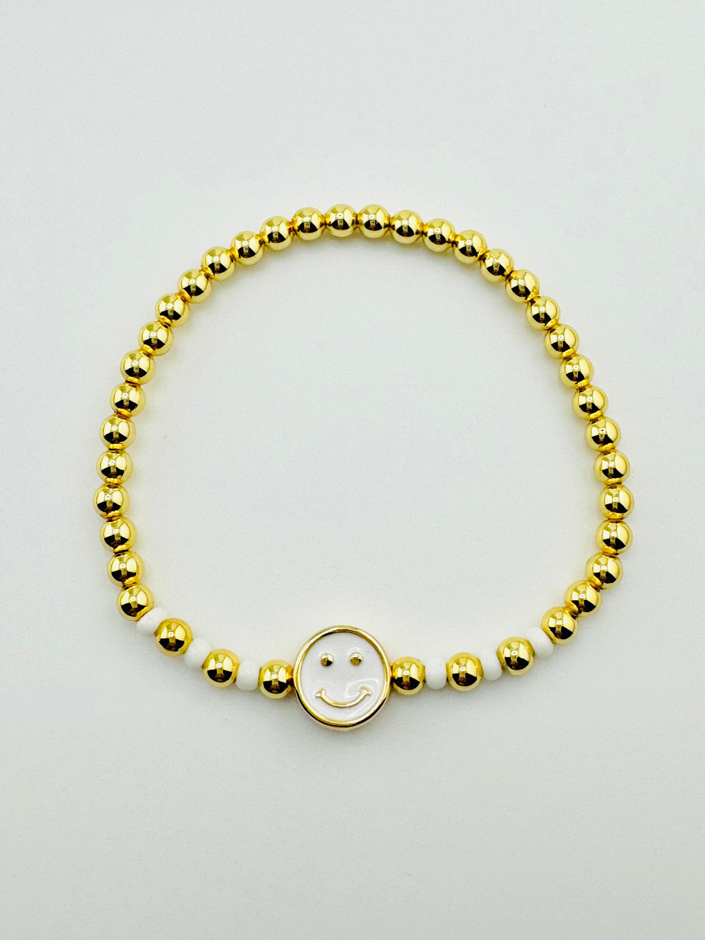 Caroline white happy face and gold filled bracelet