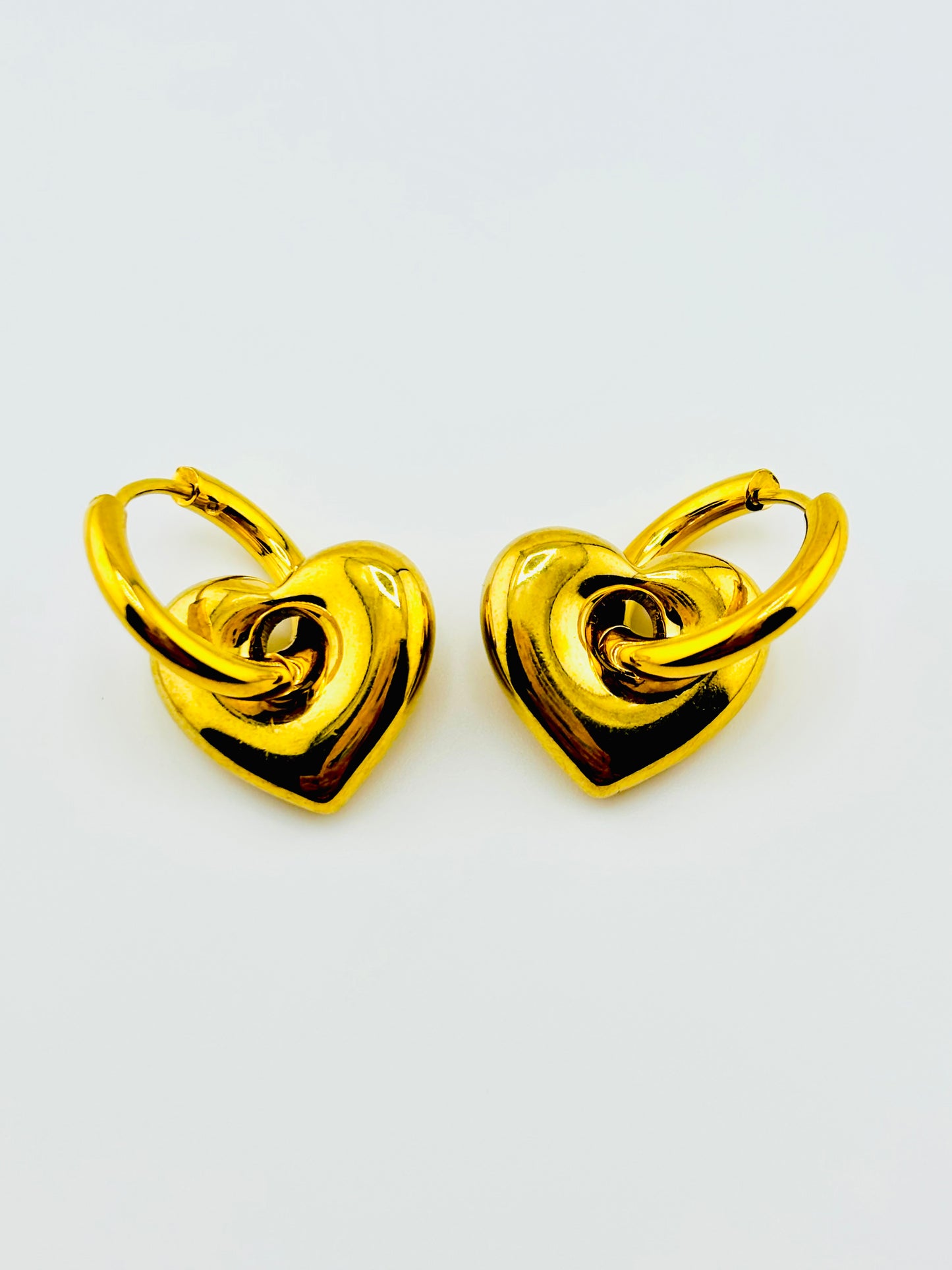 Radiate love gold hopes in hearts in stainless steel