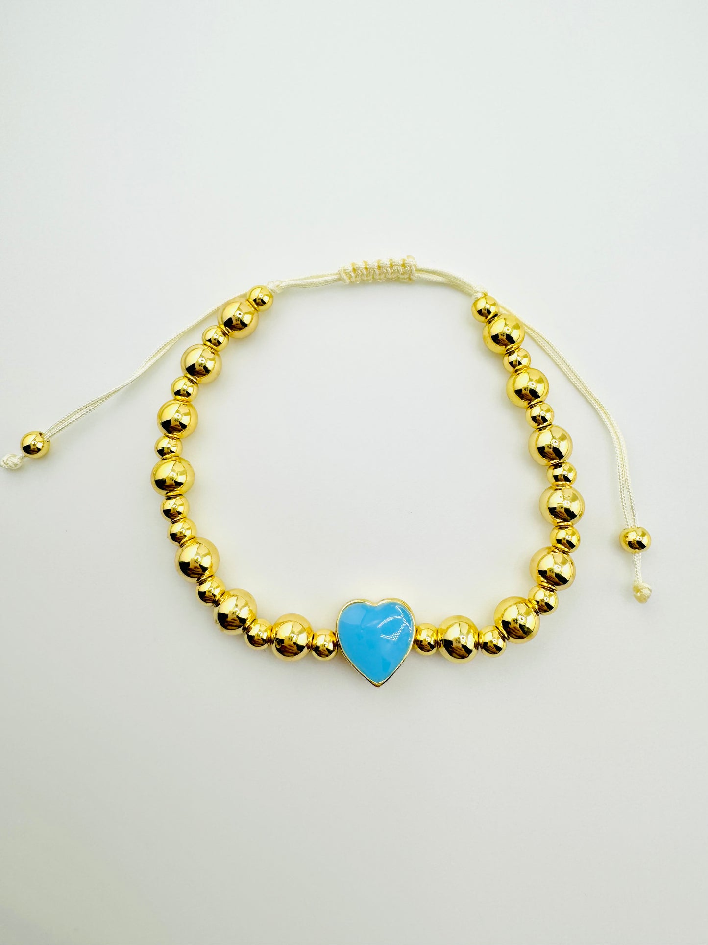 Samantha 18k gold filled bracelet with a blue enamel heart