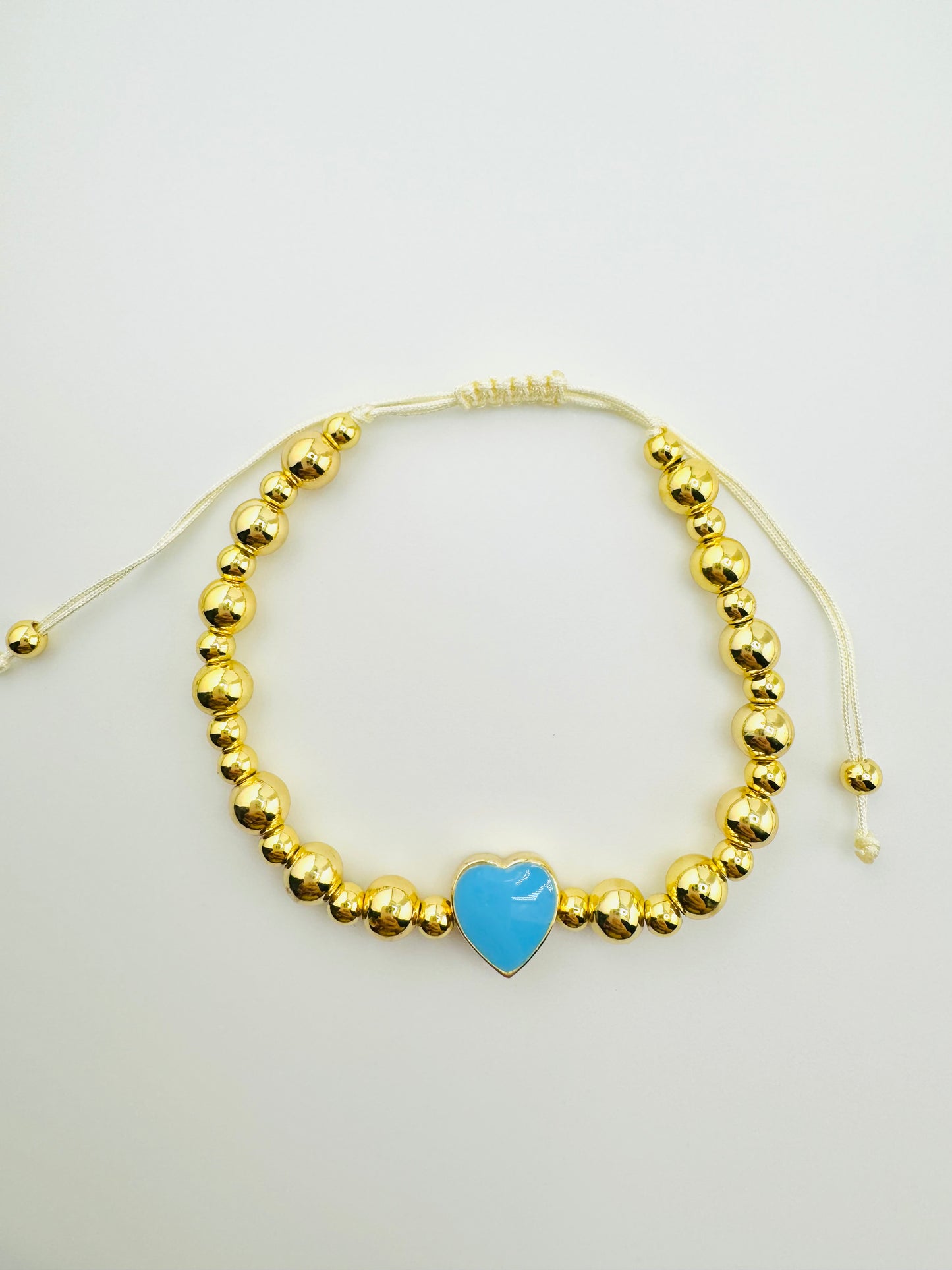 Samantha 18k gold filled bracelet with a blue enamel heart