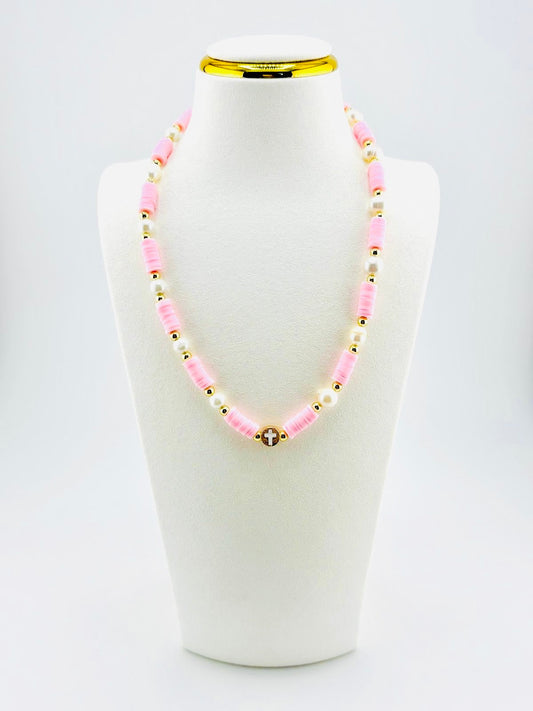 The cross beautifully made real fresh water pearls in soft pink and 18k gold filled
