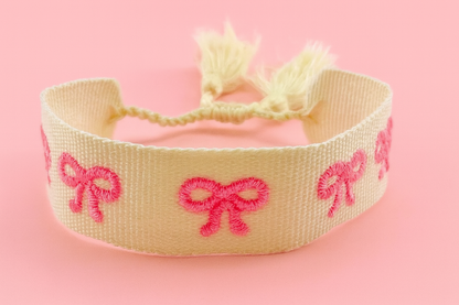 Gorgeous pink and cream coquette bow style woven bracelet