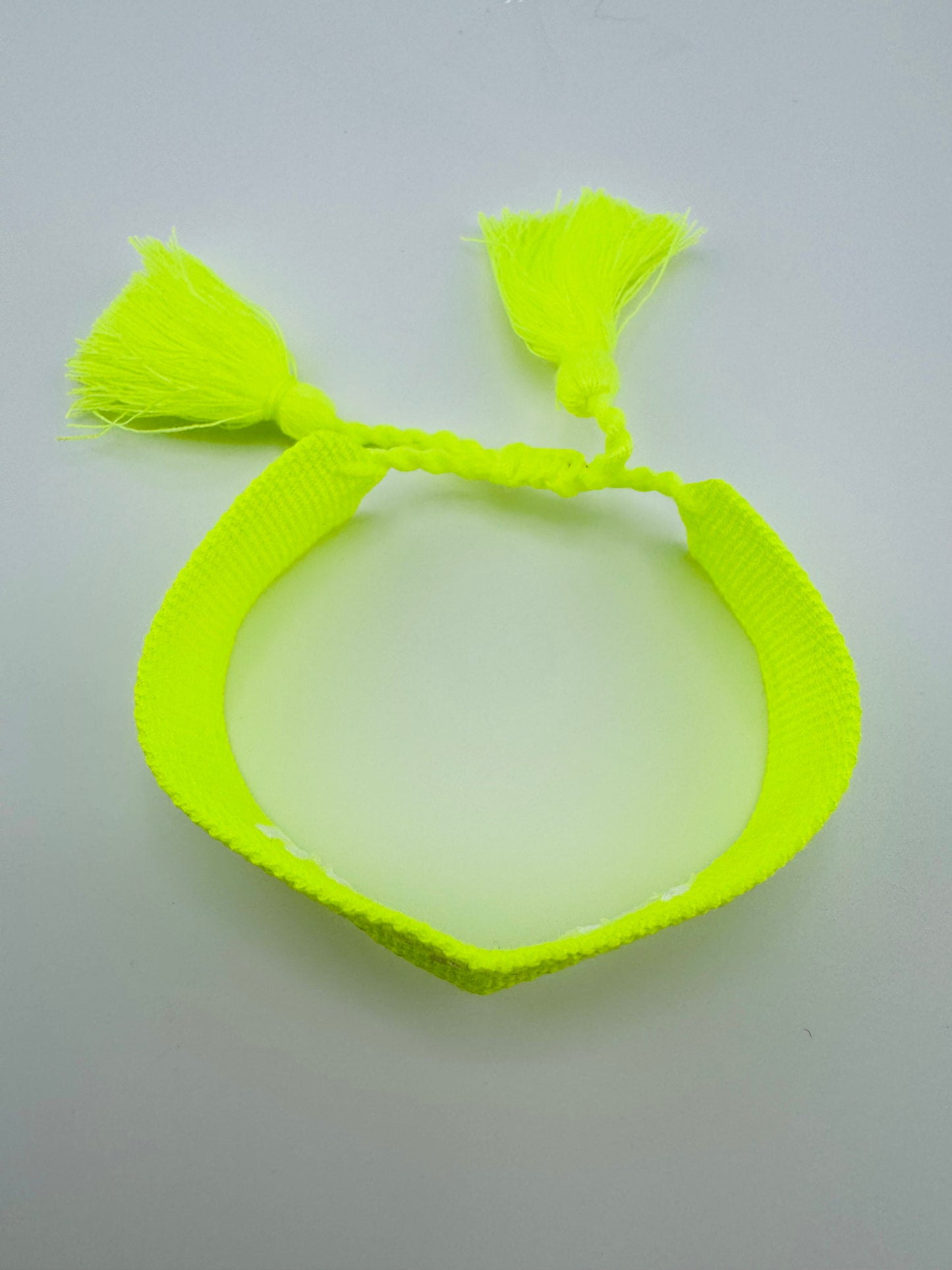Loren yellow neon woven bracelet in smiley face