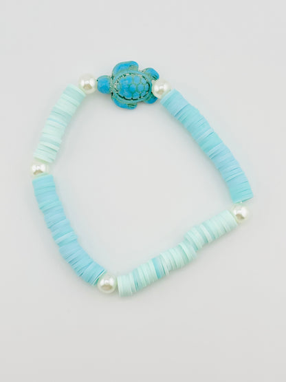 Quenelle blue beaded bracelet
