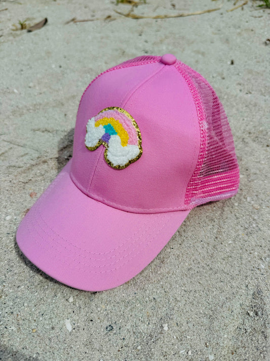 Angel pink cap with a rainbow patch