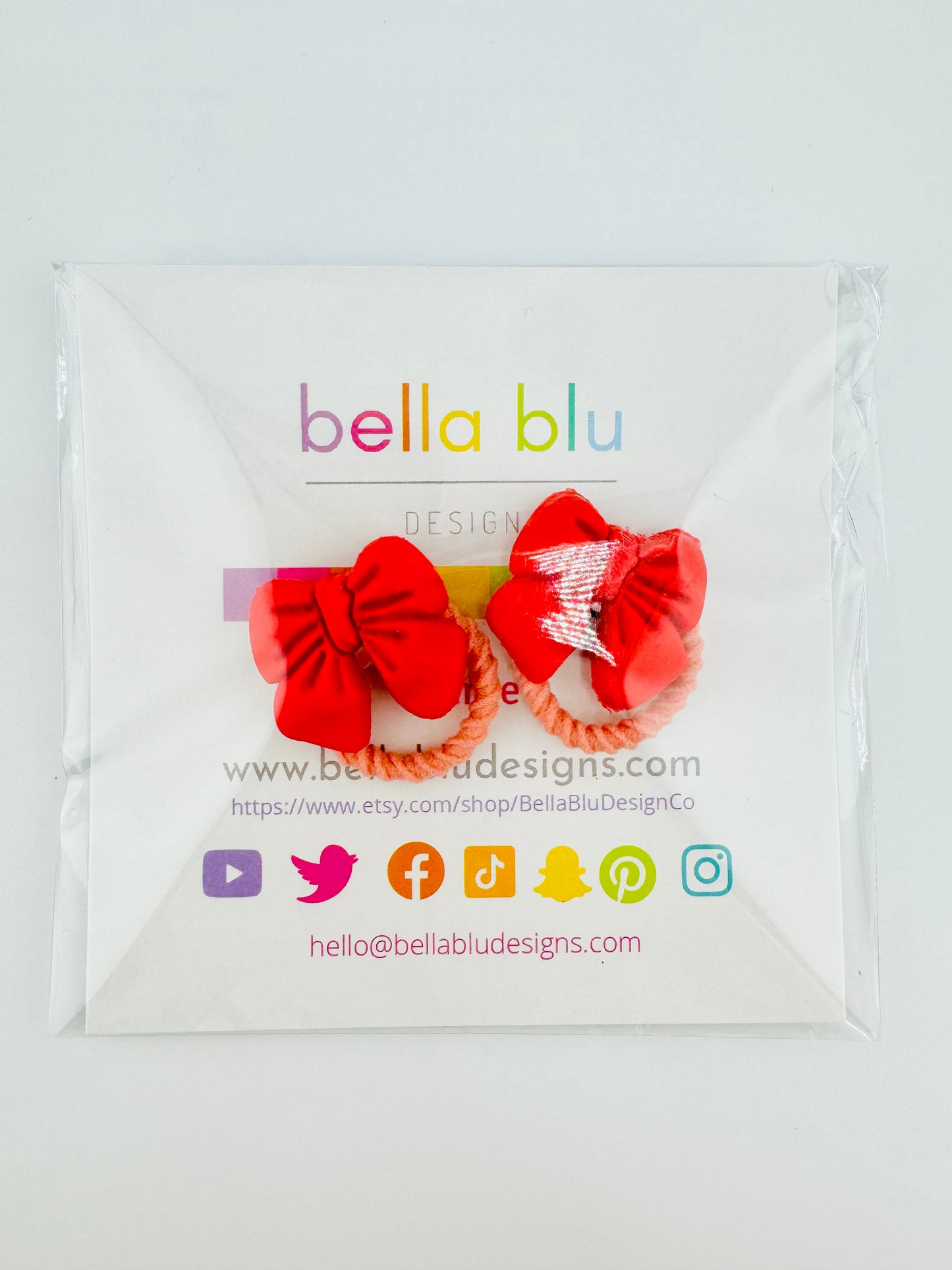 Red coquete clay bow hair ties