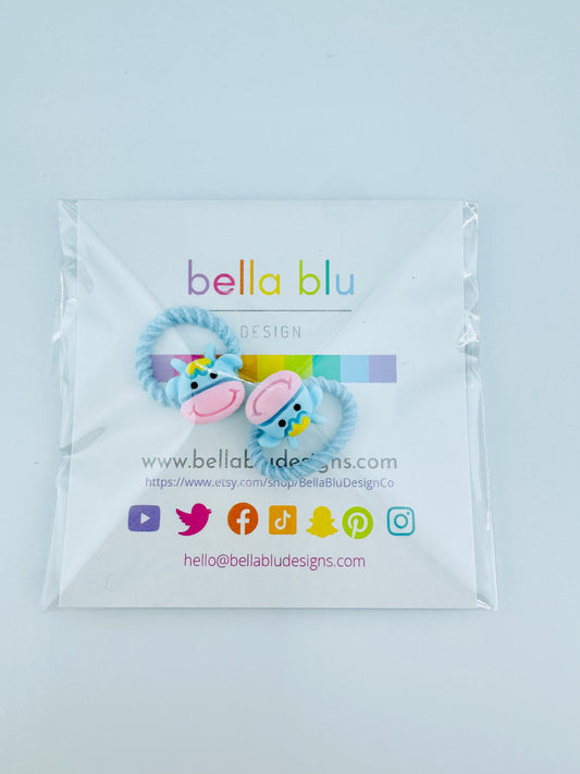 light blue and pink cow hair ties set
