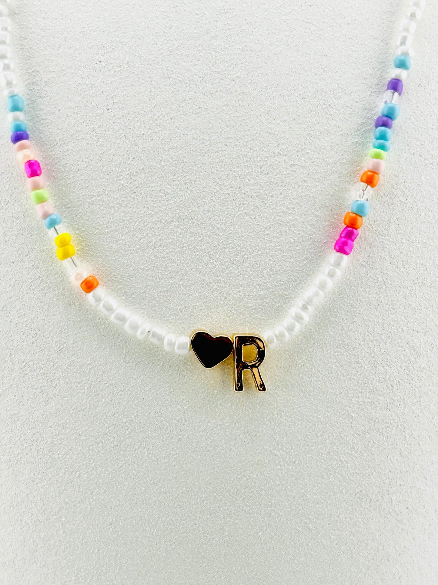 R beaded Initial necklace in white and pastel colors