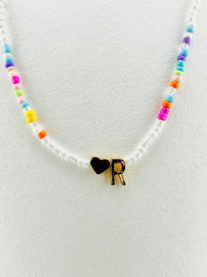 R beaded Initial necklace in white and pastel colors