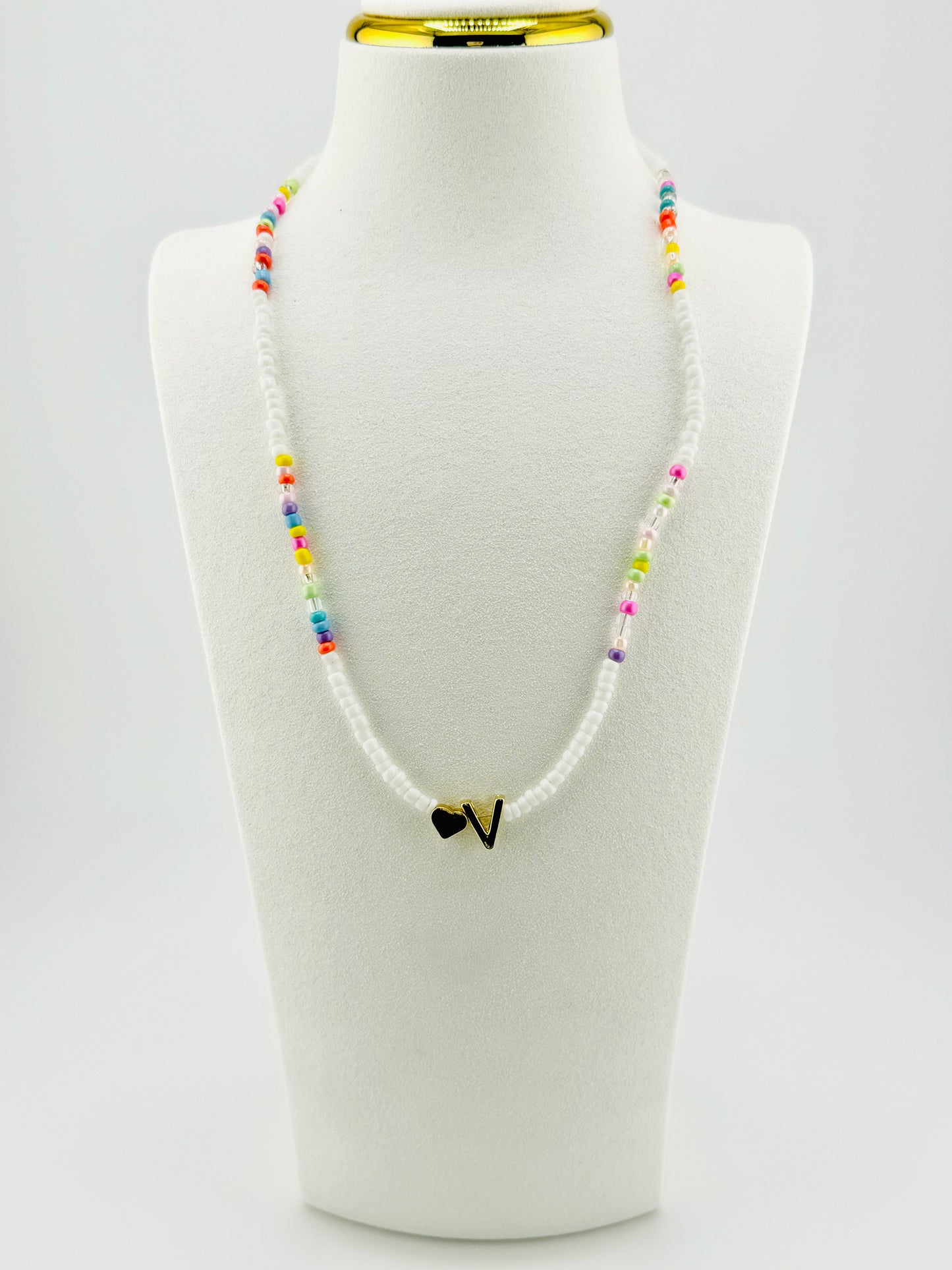 V beaded Initial necklace in white and pastel colors