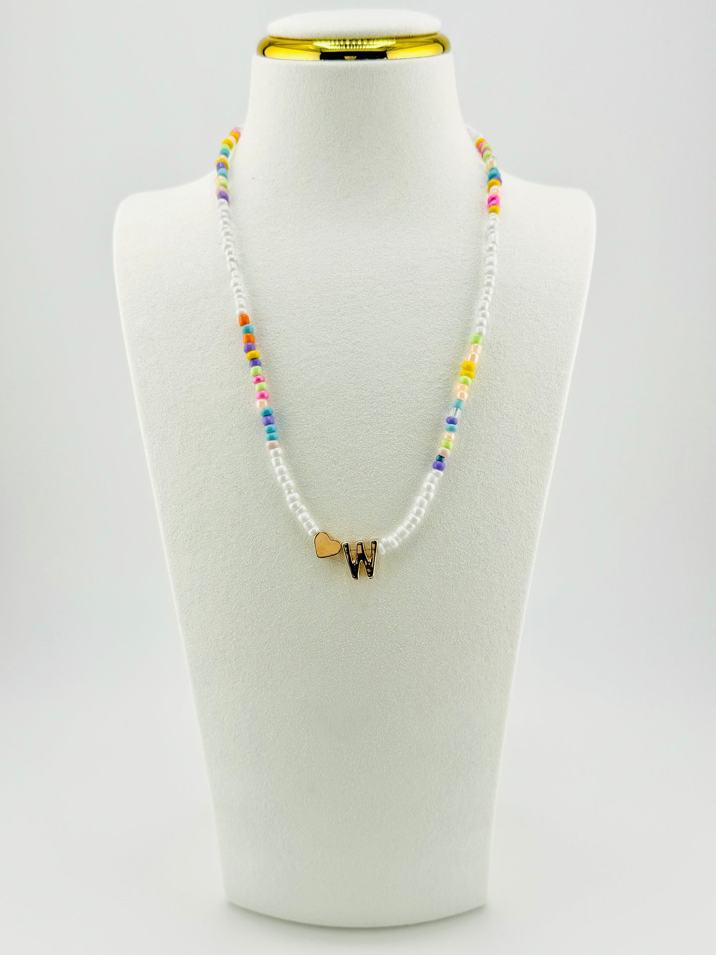 W beaded Initial necklace in white and pastel colors