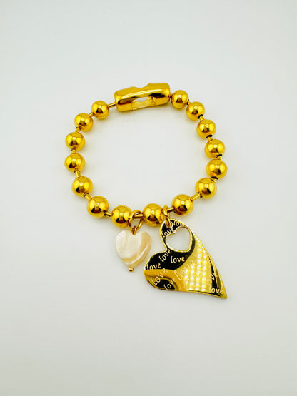 Celine stainless steel bracelet with a heart charm