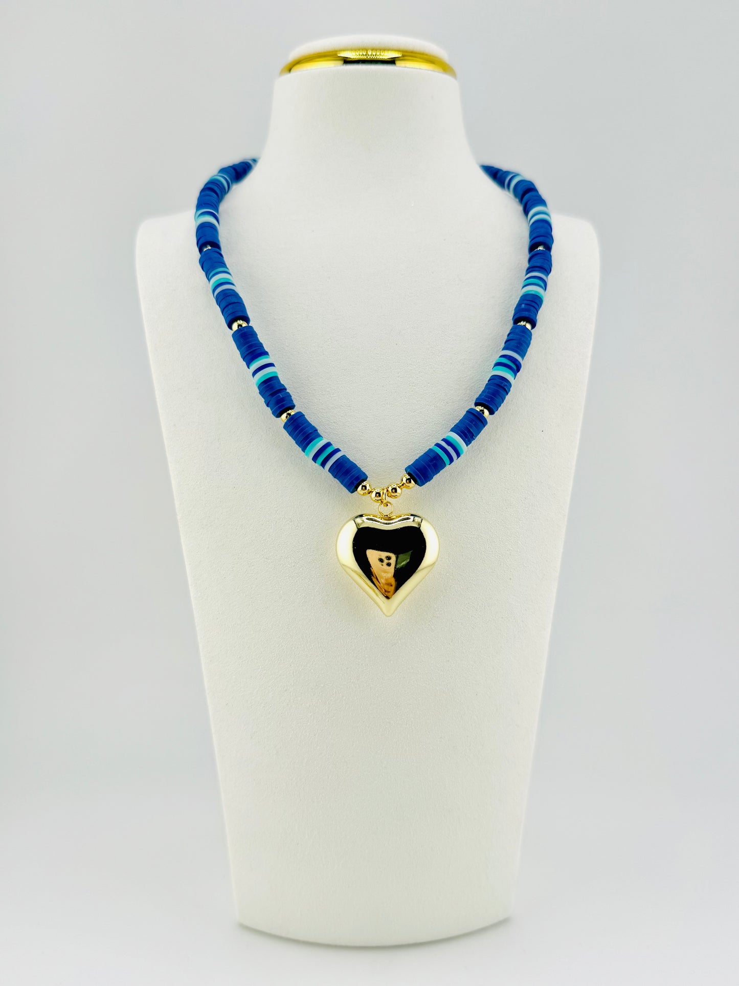 Blue heishi necklace with a heart pendant in 18k gold filled