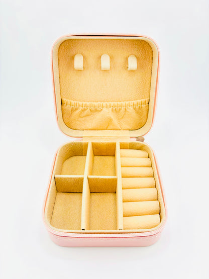 Letter V travel jewelry case in pink
