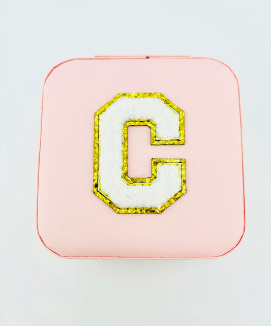 Letter C travel jewelry case in pink