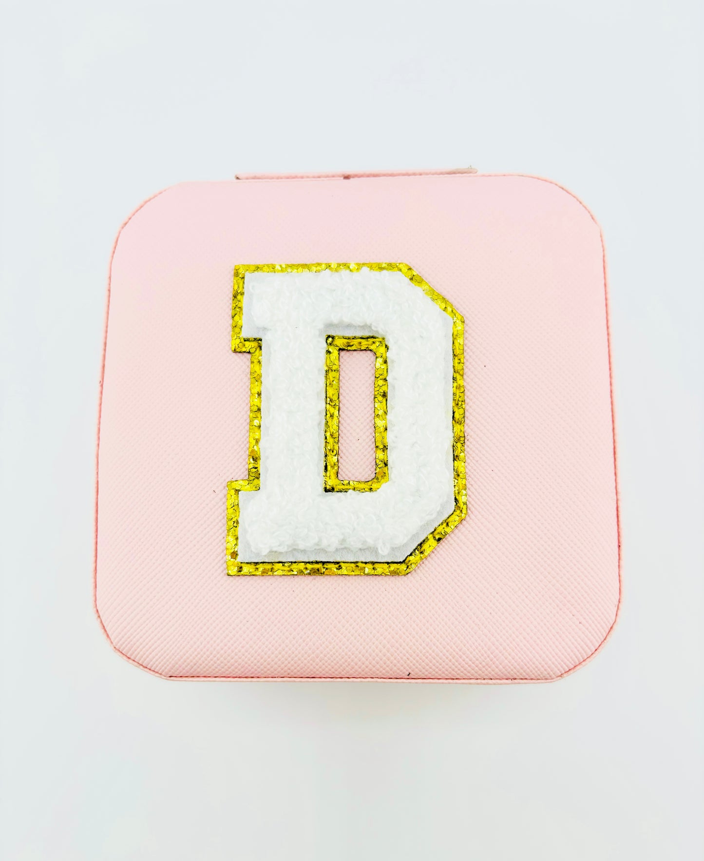 Letter D travel jewelry case in pink