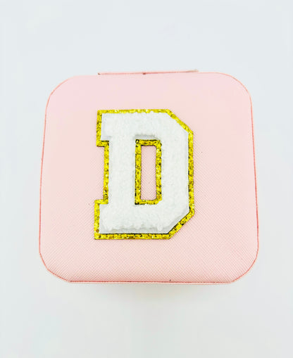 Letter D travel jewelry case in pink