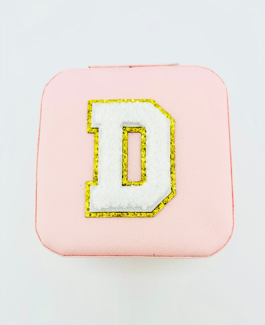 Letter D travel jewelry case in pink