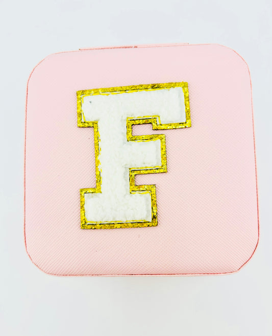 Letter F travel jewelry case in pink