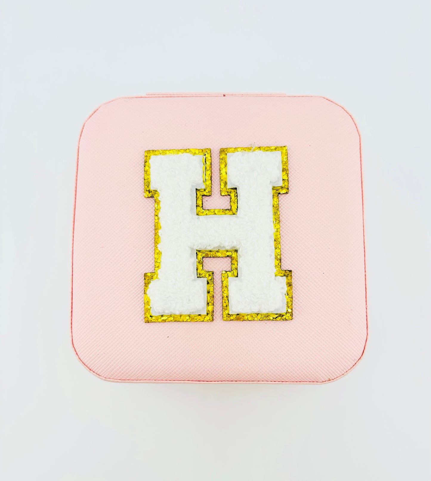 Letter H travel jewelry case in pink