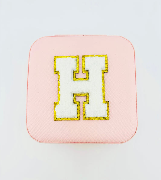 Letter H travel jewelry case in pink