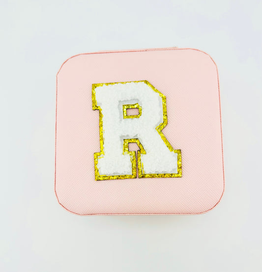 Letter R travel jewelry case in pink