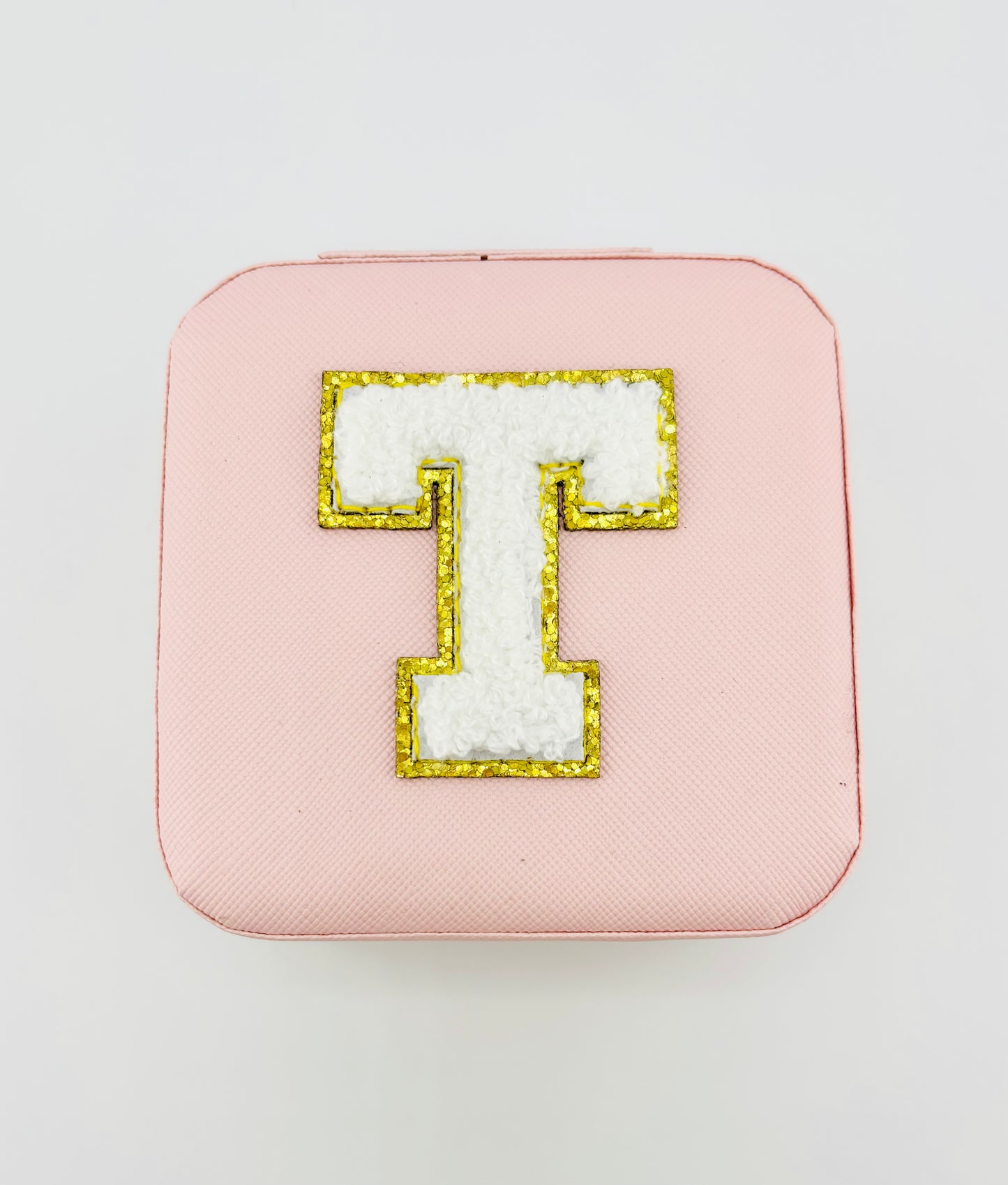 Letter T travel jewelry case in pink