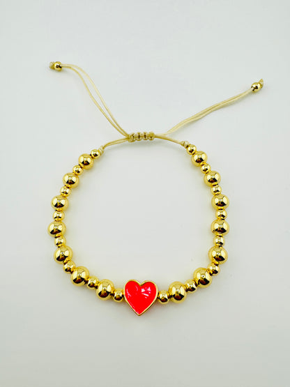 Samantha gold filled bracelet with a hot pink heart
