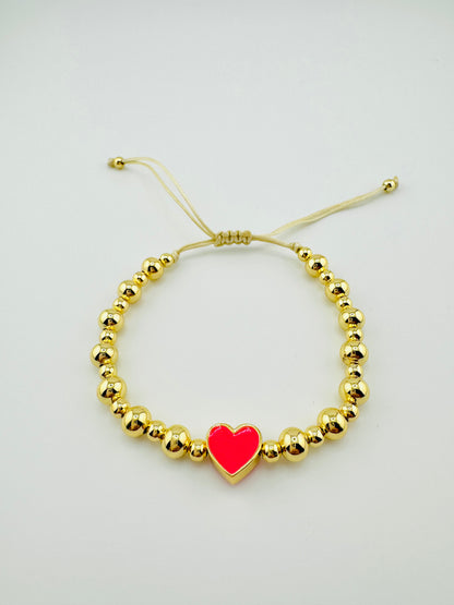 Samantha gold filled bracelet with a hot pink heart