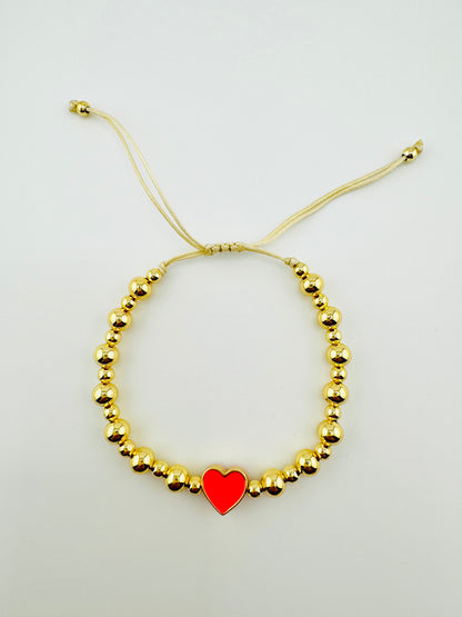 Samantha gold filled bracelet with a hot pink heart