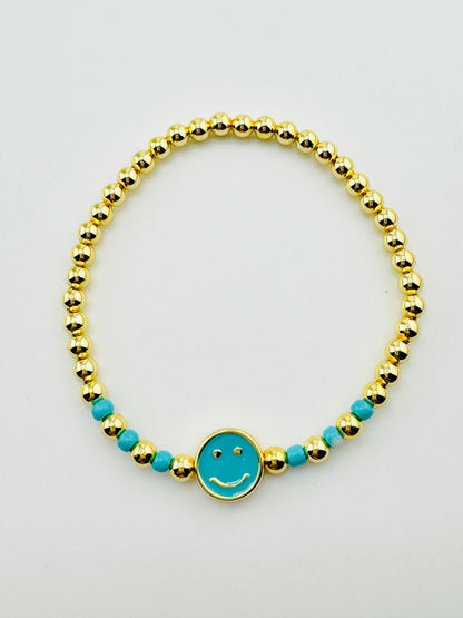 Quinn turquoise gold filled bracelet with a happy face